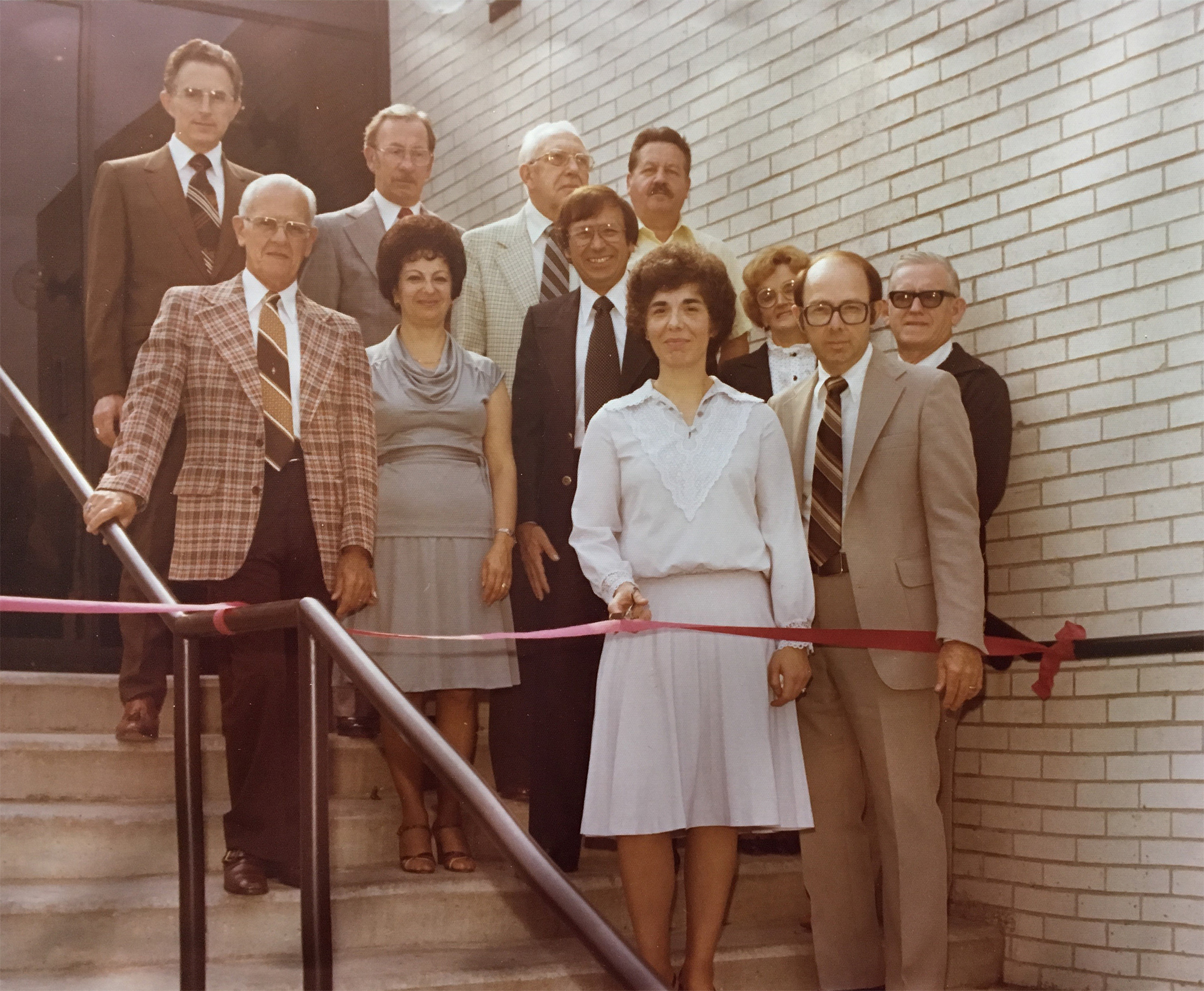 Image: Old photo of a ribbon cutting at BWFCU main office expansion
